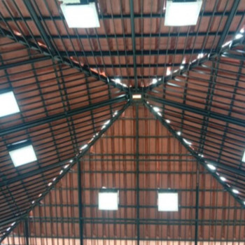 Interior view of Nanosun circular daylight PEB model for Mangalore tiles roofing .png